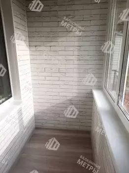 Отделка балкона и установка потайного люка